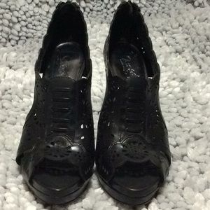 Carlos Santana heels